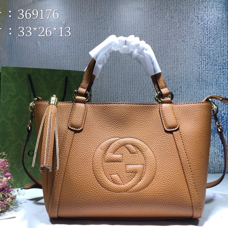 G*u*i shopping bags